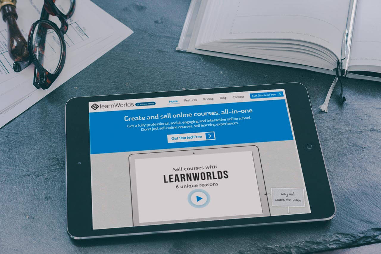 LearnWorlds website mockup on a tablet.