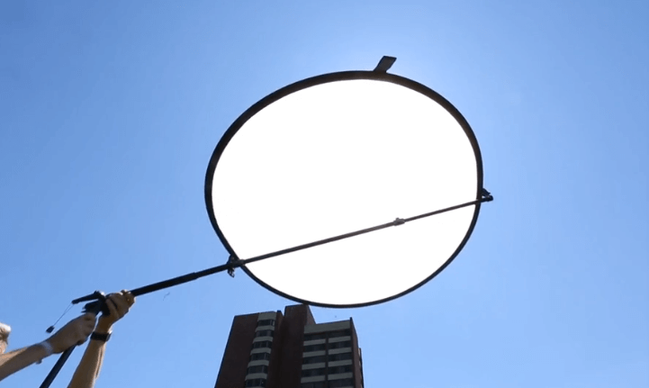 Using a light reflector from the top down.