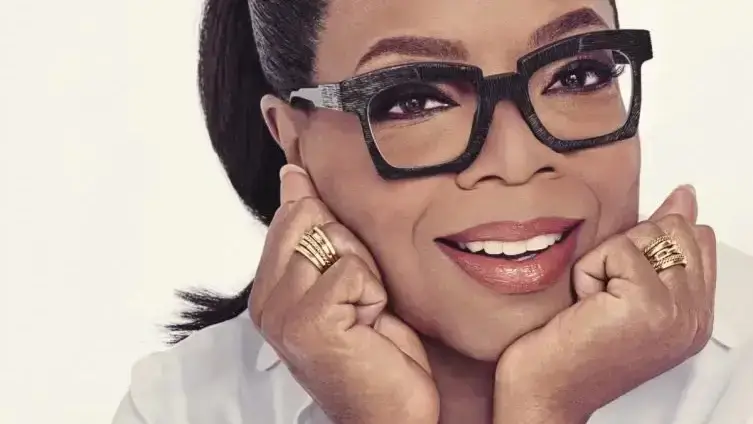 A close up photograph of Oprah Winfrey, the world's richest black woman.