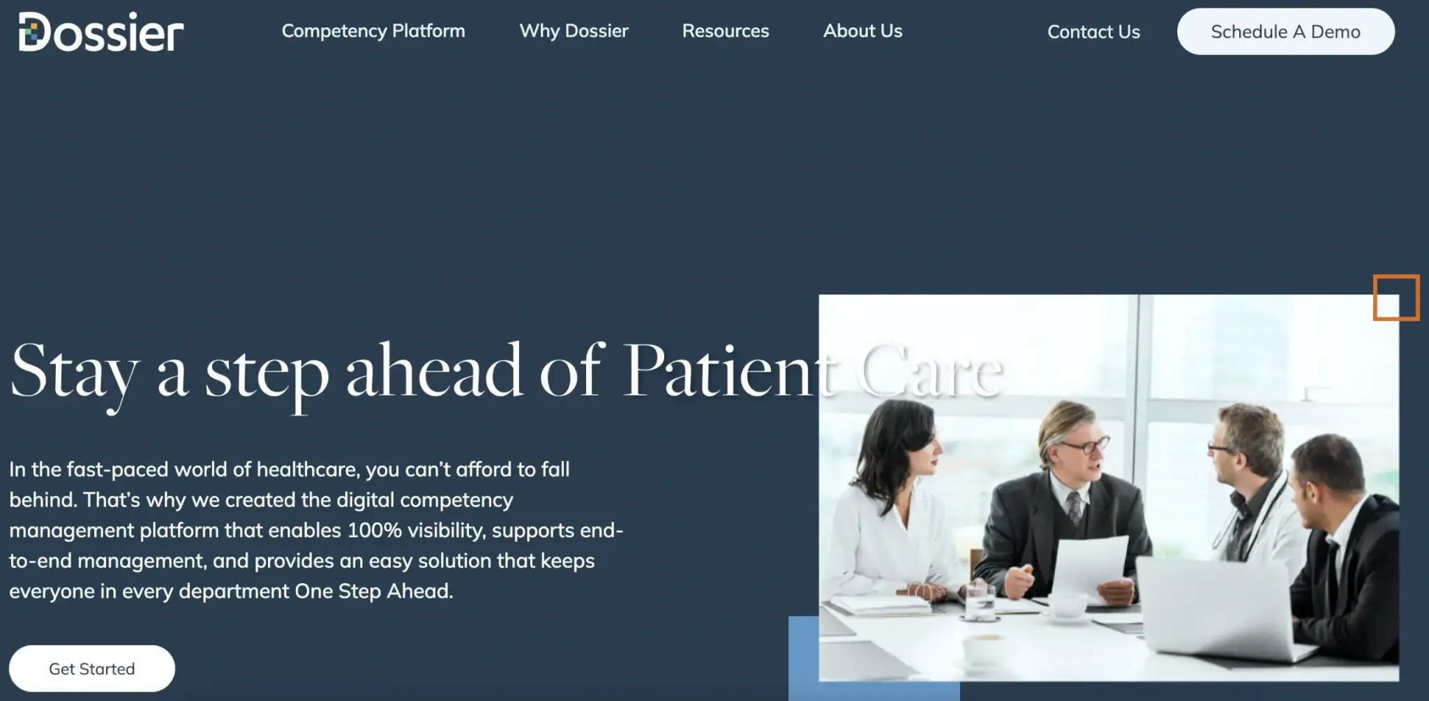 an image of Dossier's landing page showing a group of medical professionals discussing, seated and with laptops