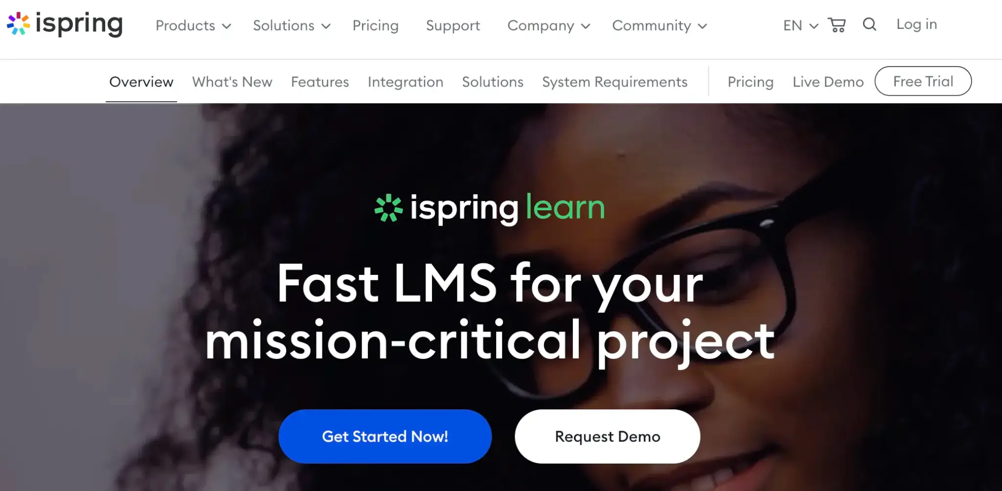 an image of the iSpring Learn landing page showing a young woman with glasses