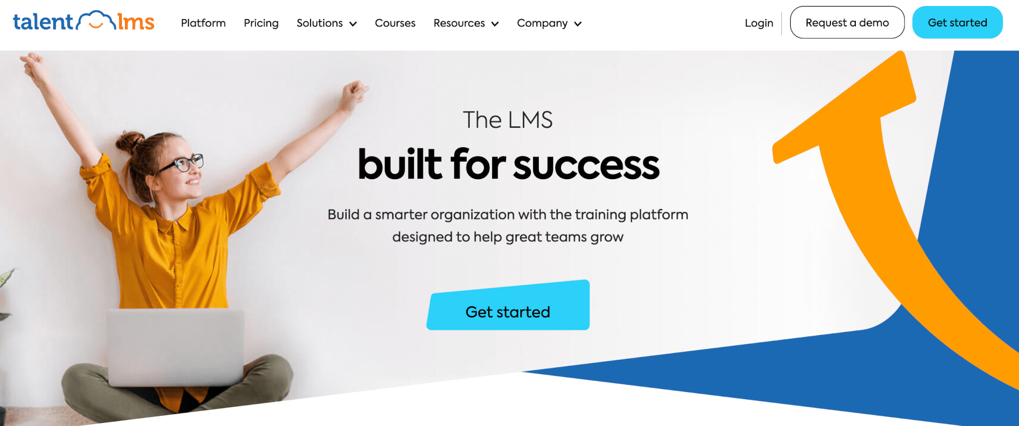 a screenshot of a TalentLMS landing page showing a smiling young woman with laptop stretching her arms