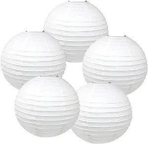 White paper lanterns for a lighting setup to soften light.