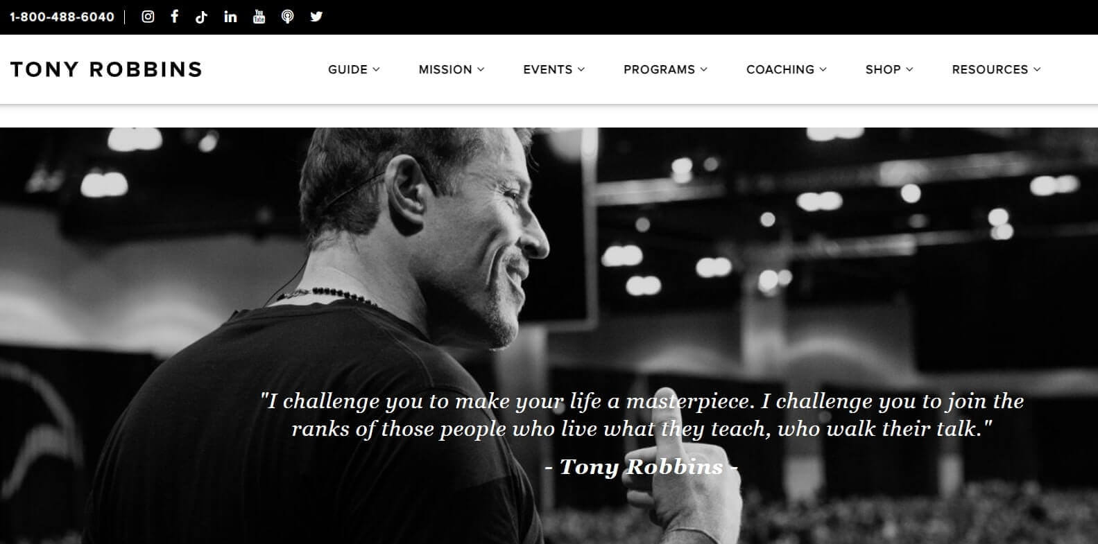 A black and white screenshot of Tony Robbins' website featuring an inspirational quote by him.