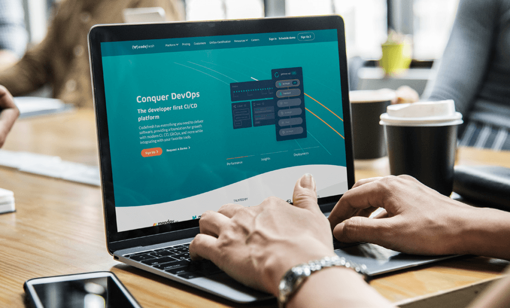 An image showing a laptop  screen that features Codefresh's academy site.