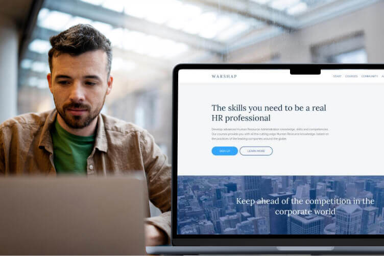Professional working on a laptop beside a LearnWorlds training platform preview designed for HR and corporate training programs.