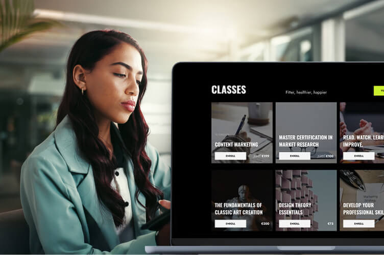 Course creator using a laptop next to a dark-themed online course marketplace interface showcasing video classes and educational content.